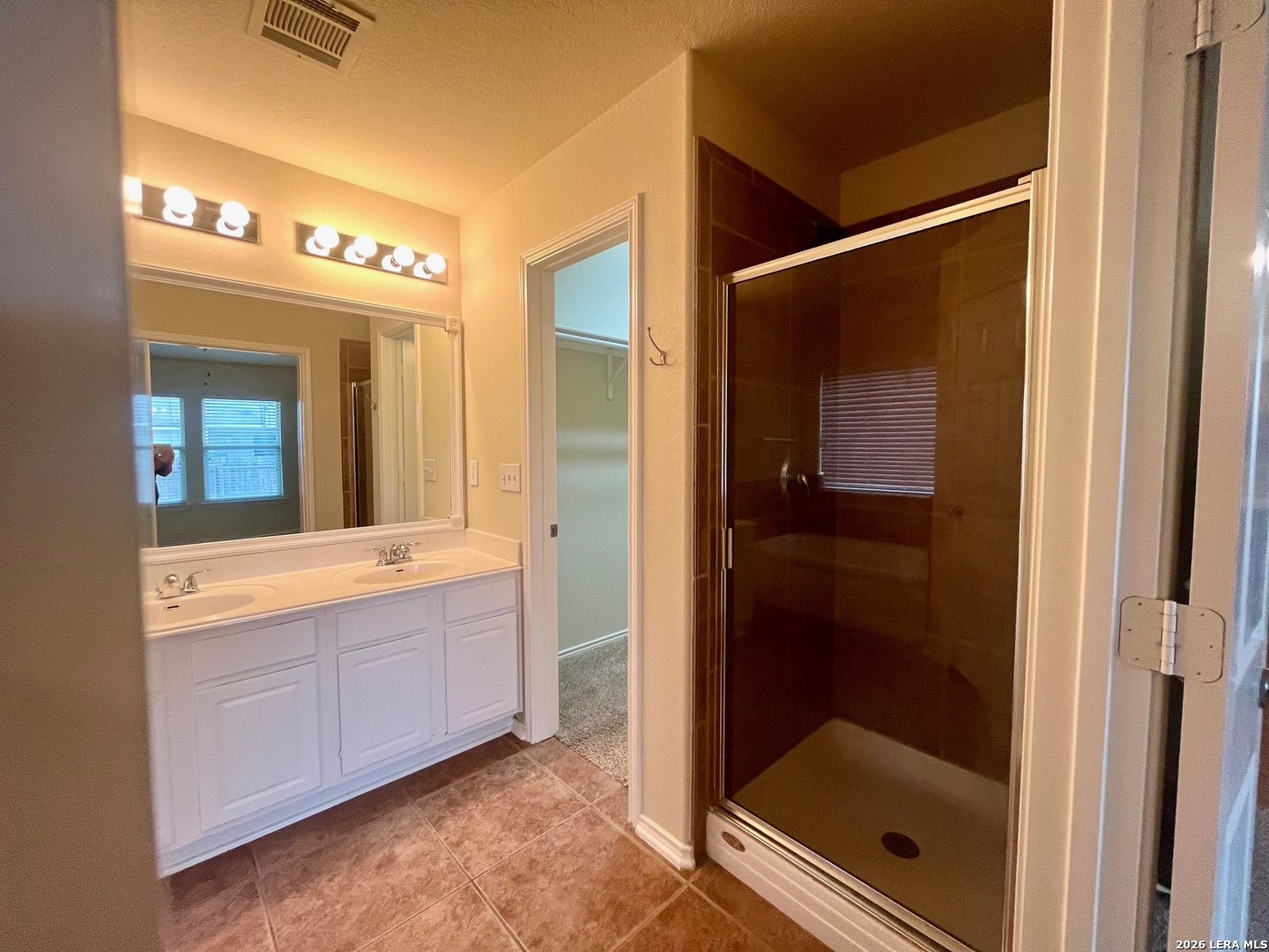 225 Brahma Way Cibolo, TX 78108 - Photo 15 of 24 a bathroom with a bathtub and a shower