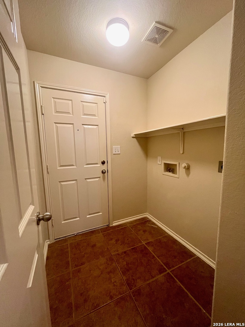 225 Brahma Way Cibolo, TX 78108 - Photo 18 of 24 a bathroom with a sink and a shower
