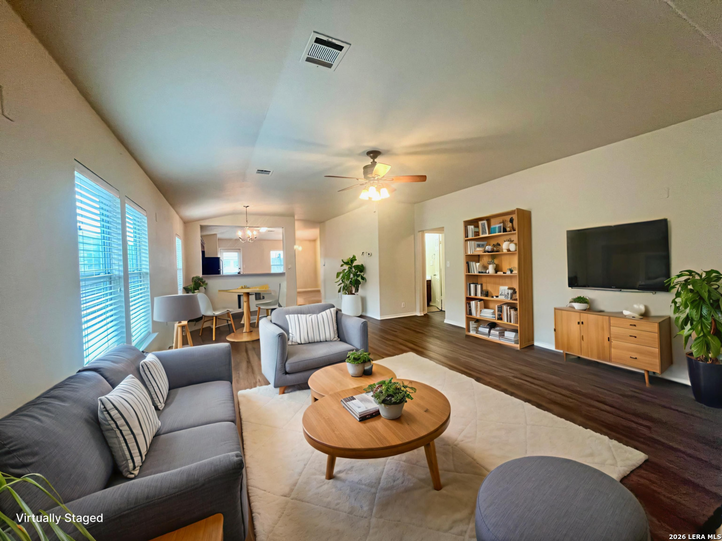 225 Brahma Way Cibolo, TX 78108 - Photo 7 of 24 a living room with furniture and a flat screen tv