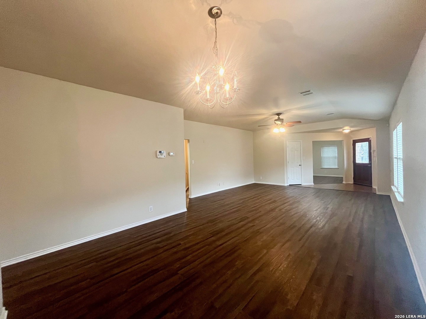 225 Brahma Way Cibolo, TX 78108 - Photo 9 of 24 a view of empty room with wooden floor
