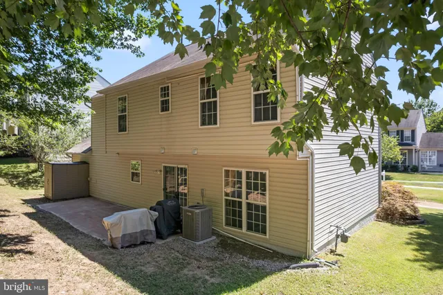front view of a house with a small yard