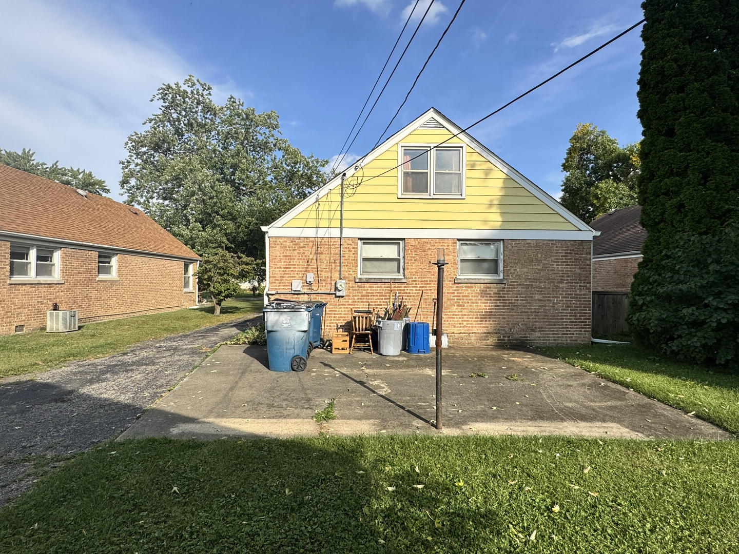 112 Iowa Avenue Addison, IL 60101 - Photo 13 of 16 a view of a house with backyard and sitting area
