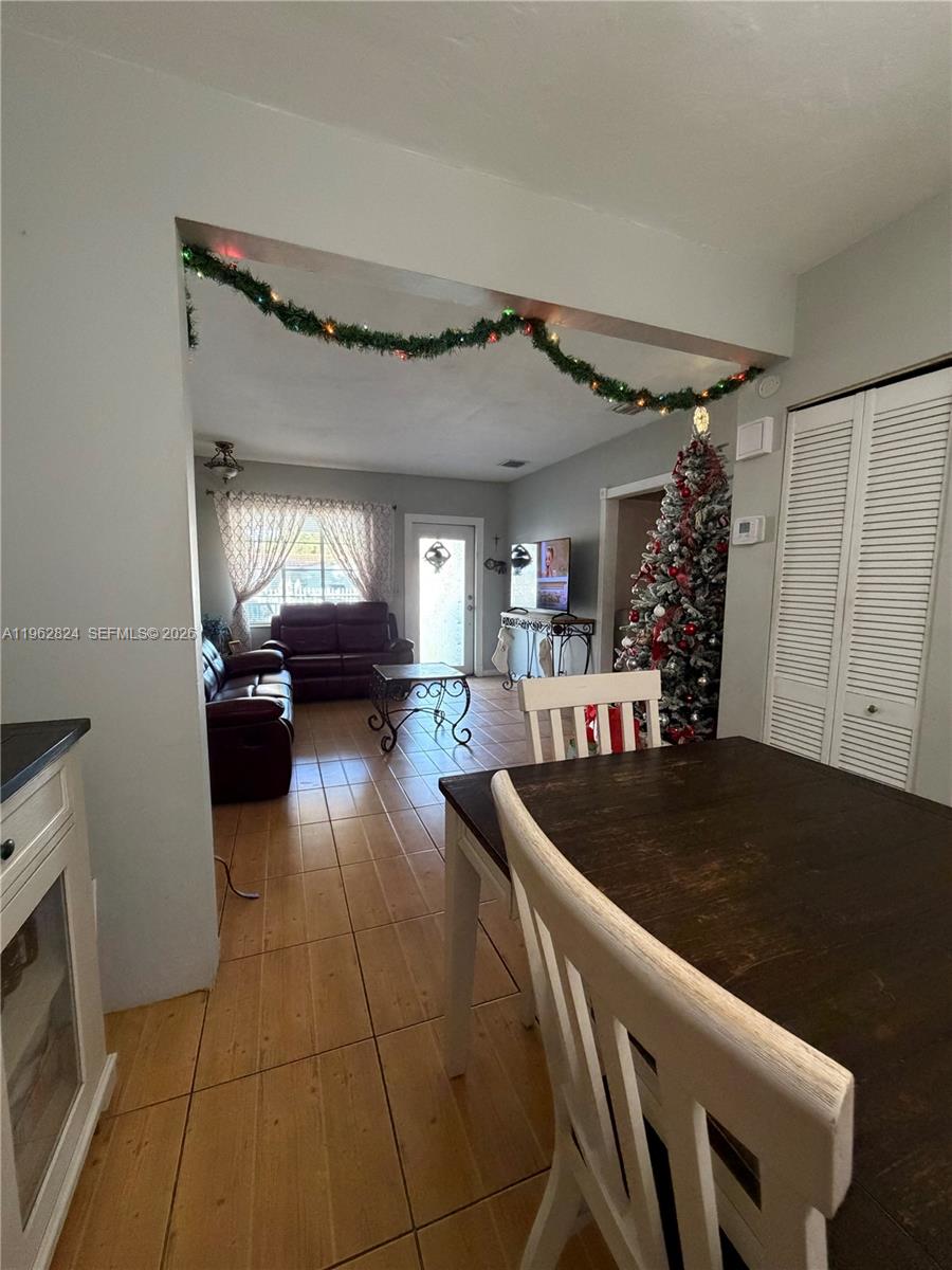 2460 Northwest 33rd Street Miami, FL 33142 - Photo 8 of 33 a living room with furniture