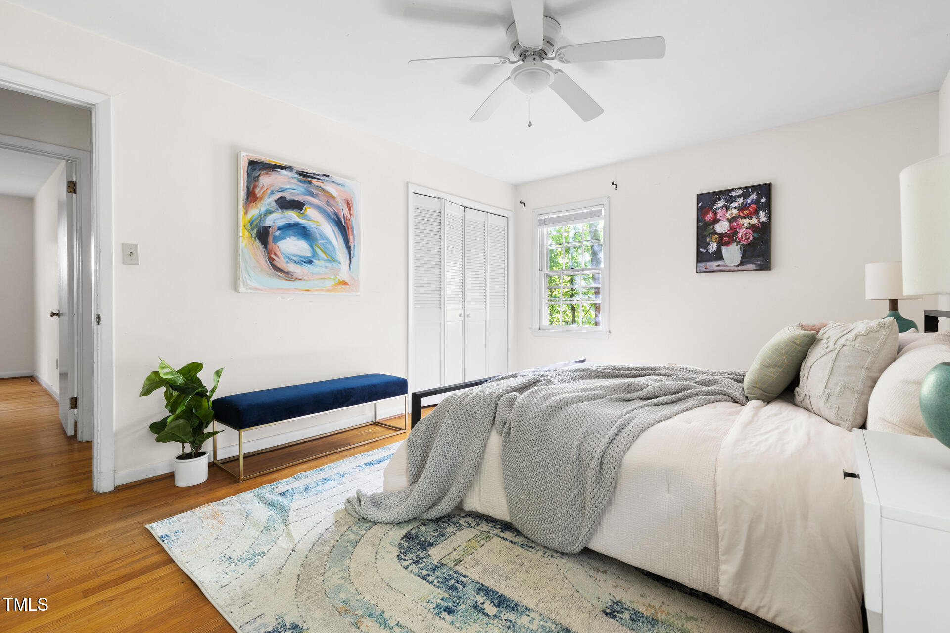 324 Woodhaven Road Chapel Hill, NC 27514 - Photo 21 of 32 a bedroom with a bed and a potted plant