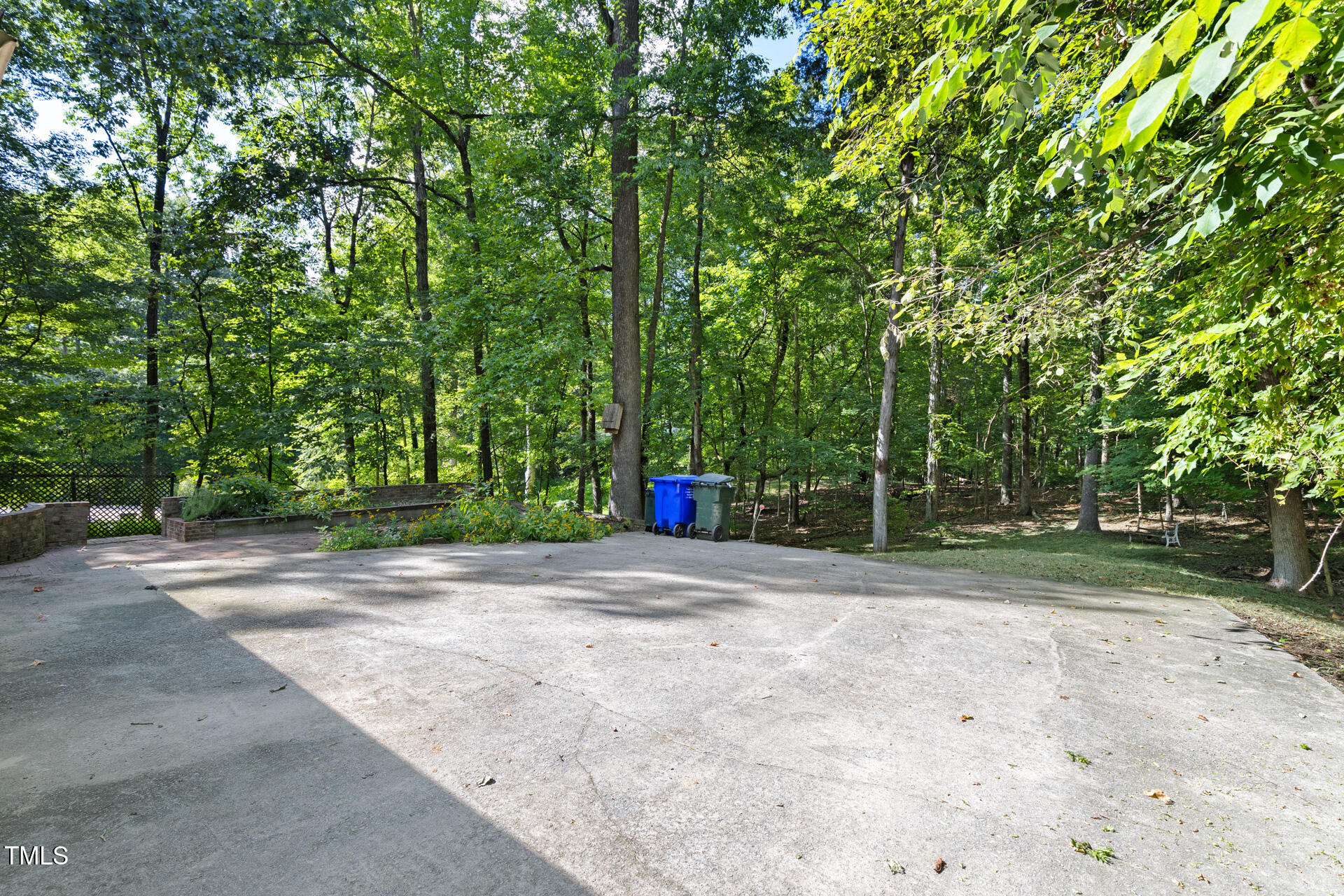 324 Woodhaven Road Chapel Hill, NC 27514 - Photo 29 of 32 a view of a field with trees in front of it