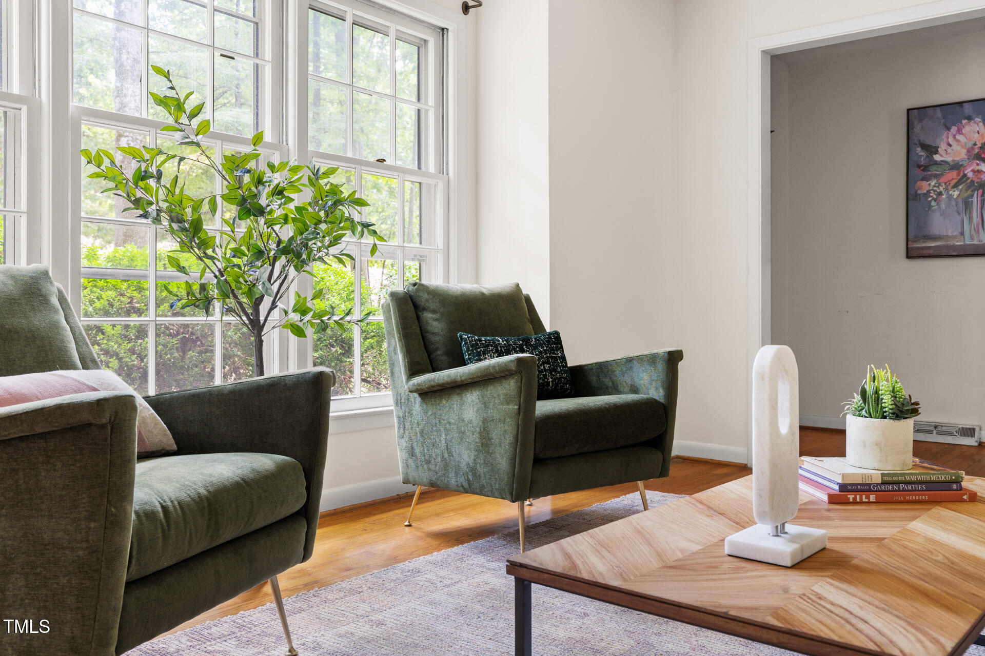 324 Woodhaven Road Chapel Hill, NC 27514 - Photo 7 of 32 a living room with furniture and a potted plant