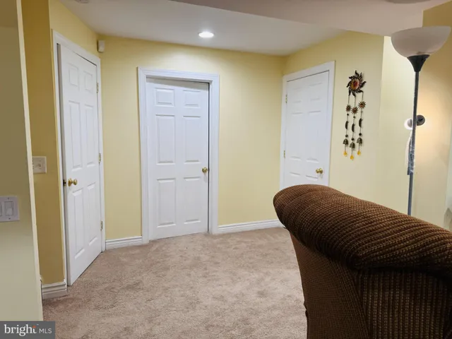 a bedroom with a bed and a shower