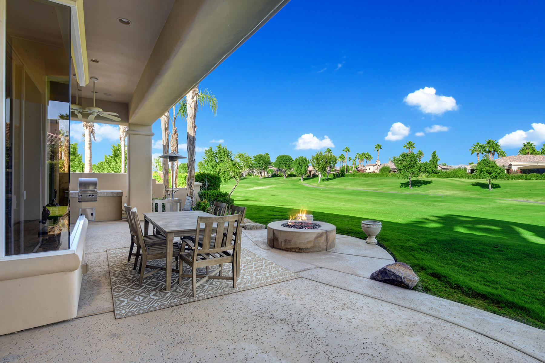 80448 Riviera La Quinta, CA 92253 - Photo 25 of 29 BACK PATIO AND FIREPIT TO FAIRWAY MLS