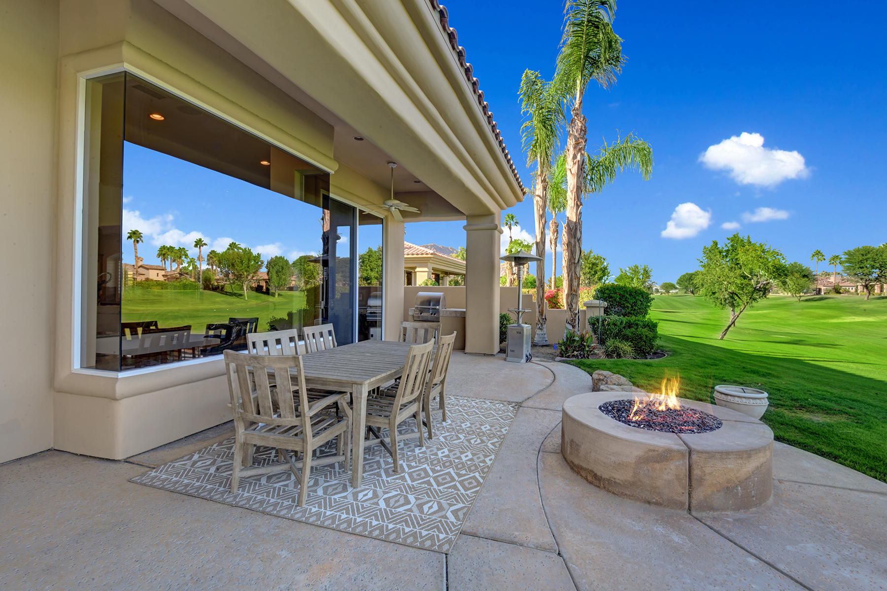 80448 Riviera La Quinta, CA 92253 - Photo 26 of 29 BACK PATIO AND FIREPIT MLS
