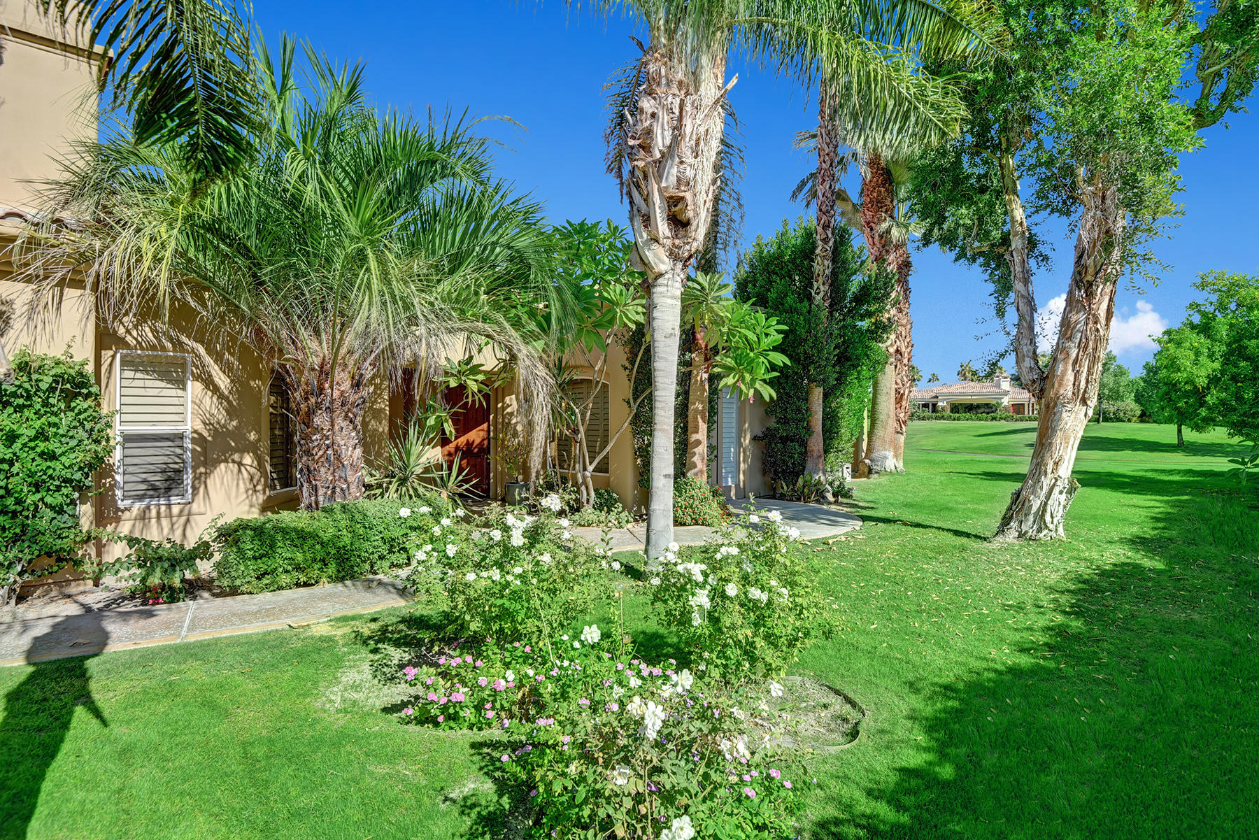 80448 Riviera La Quinta, CA 92253 - Photo 28 of 29 ENTRY COURTYARD AND SIDE GRASS YARD MLS