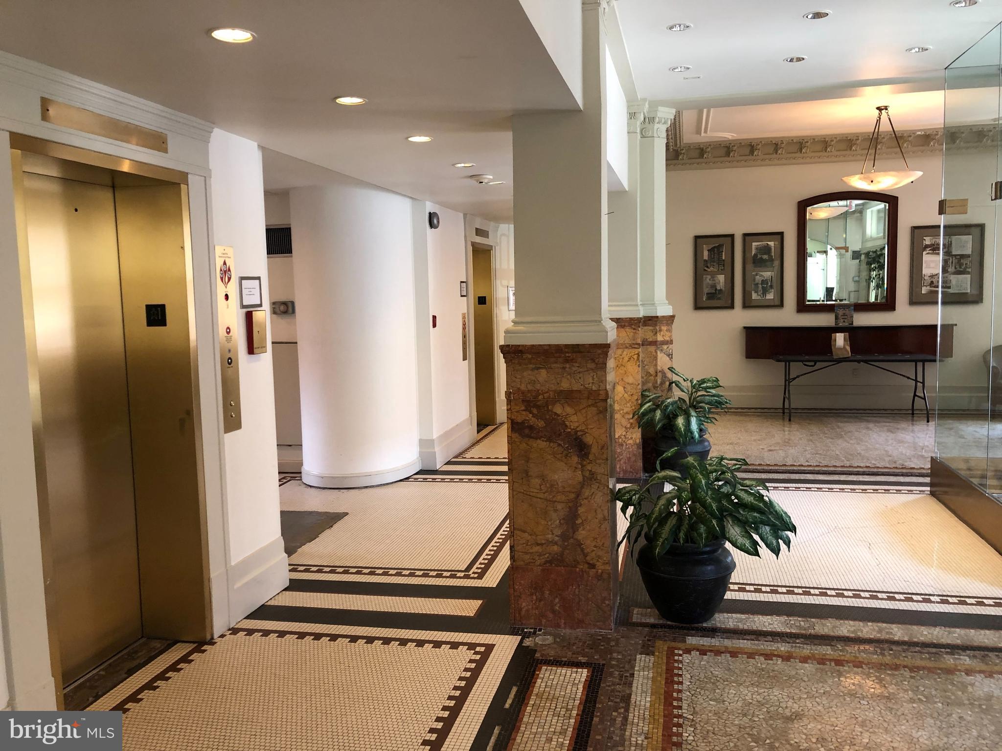 1615 Q Street Northwest, Unit 406 Washington, DC 20009 - Photo 12 of 21 24-Hour Secure Entrance