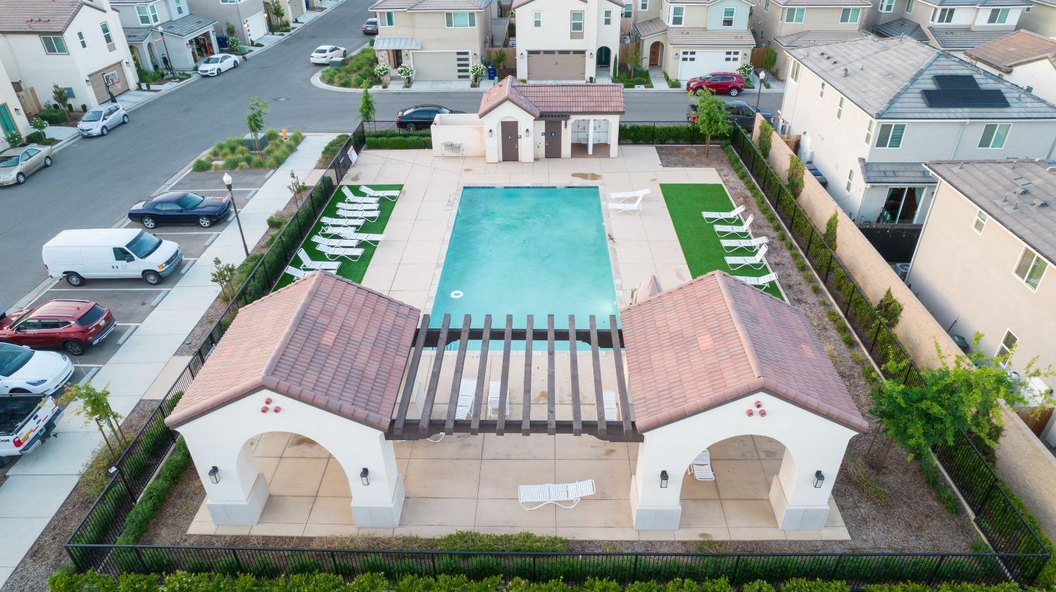 3678 Parkstone Way Clovis, CA 93619 - Photo 31 of 34 an aerial view of a house with garden space and street view