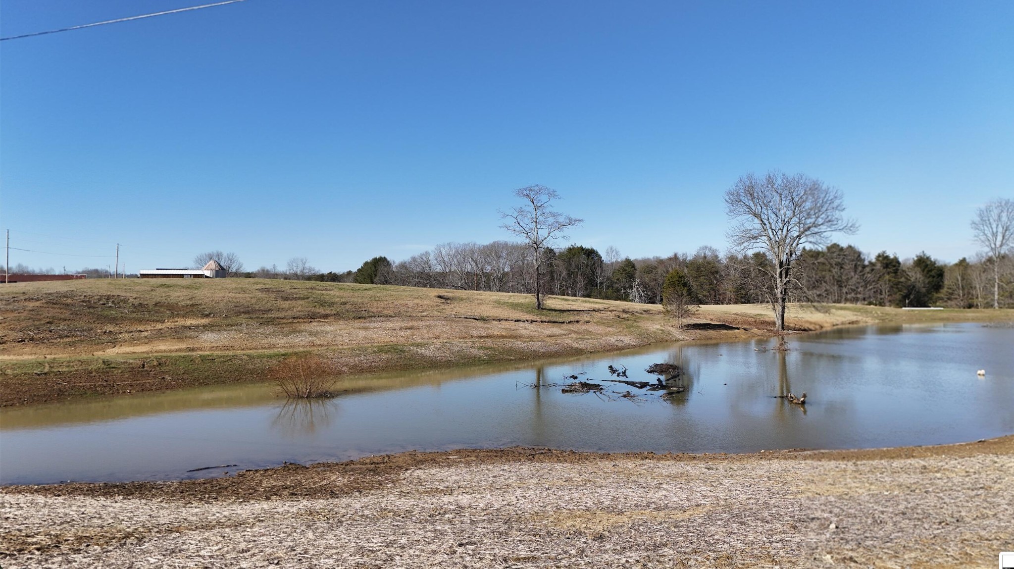 0 Old Dirt Road Graysville, TN 37338 - Photo 5 of 12 a view of a lake with beach