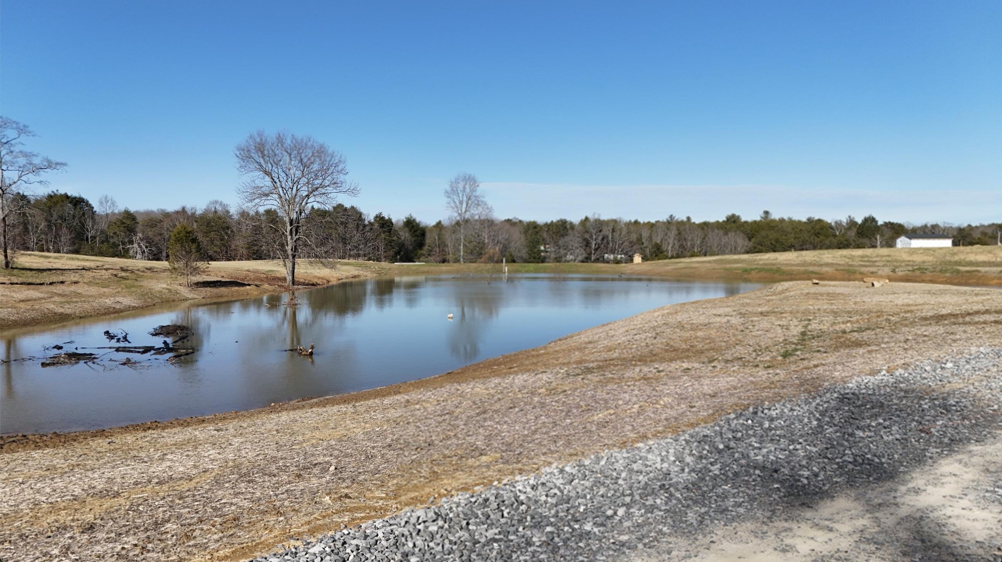 0 Old Dirt Road Graysville, TN 37338 - Photo 6 of 12 a view of a lake with houses in the back