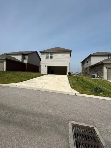 a view of kitchen with washer and dryer