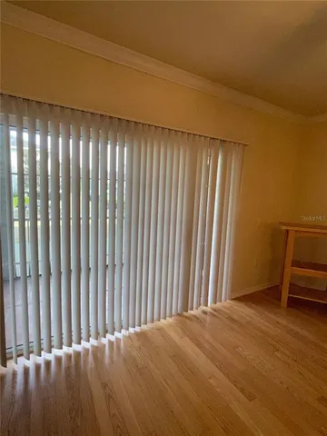 a view of outdoor space with wooden floor