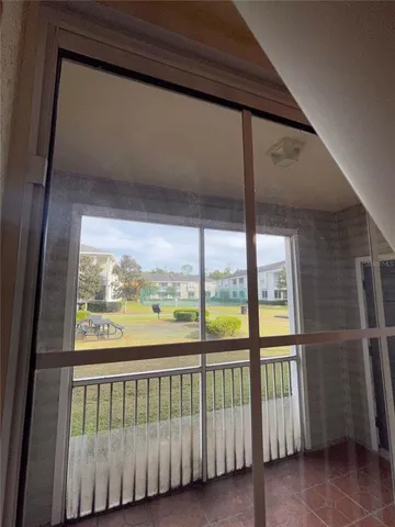 a view of a large window with an outdoor space