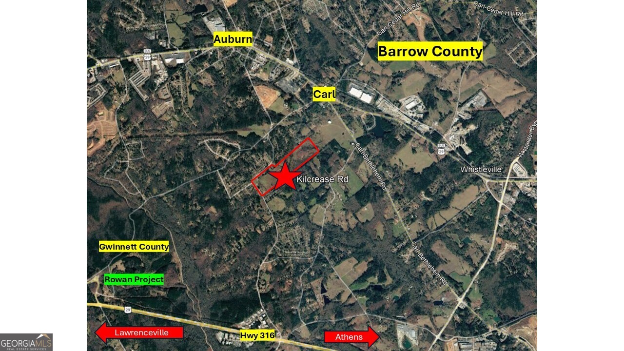 264 Kilcrease Road Auburn, GA 30011 - Photo 2 of 14 a street sign that is sitting on a wall