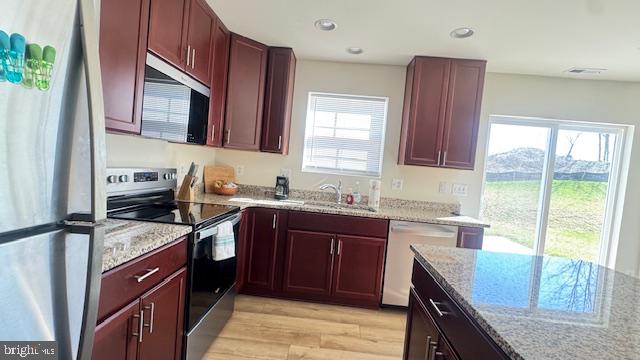 65 Chesterfield Road East Berlin, PA 17316 - Photo 10 of 28 Modern kitchen with rich cabinetry.