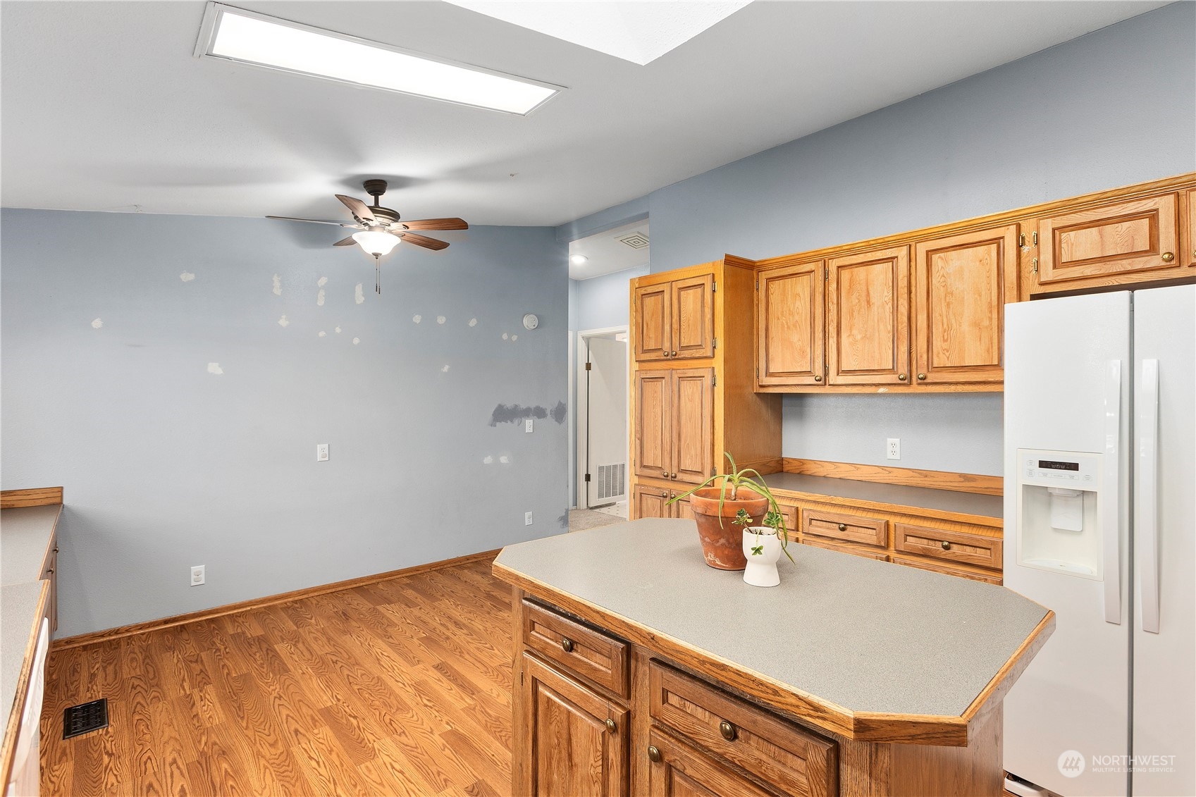 208 Carlsborg Road Sequim, WA 98382 - Photo 18 of 40 a view of a kitchen with a sink and cabinet