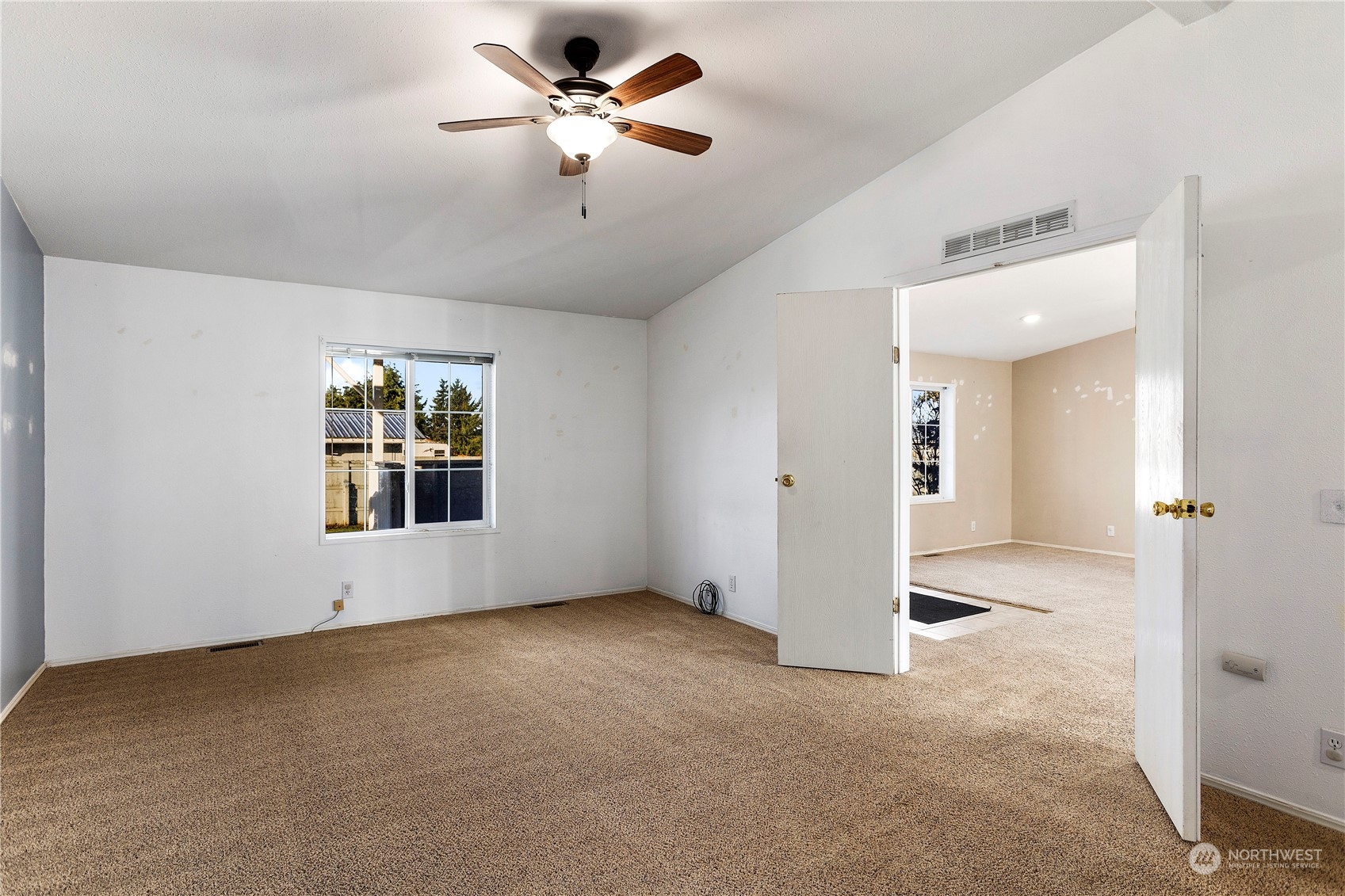 208 Carlsborg Road Sequim, WA 98382 - Photo 23 of 40 a view of an empty room with a window
