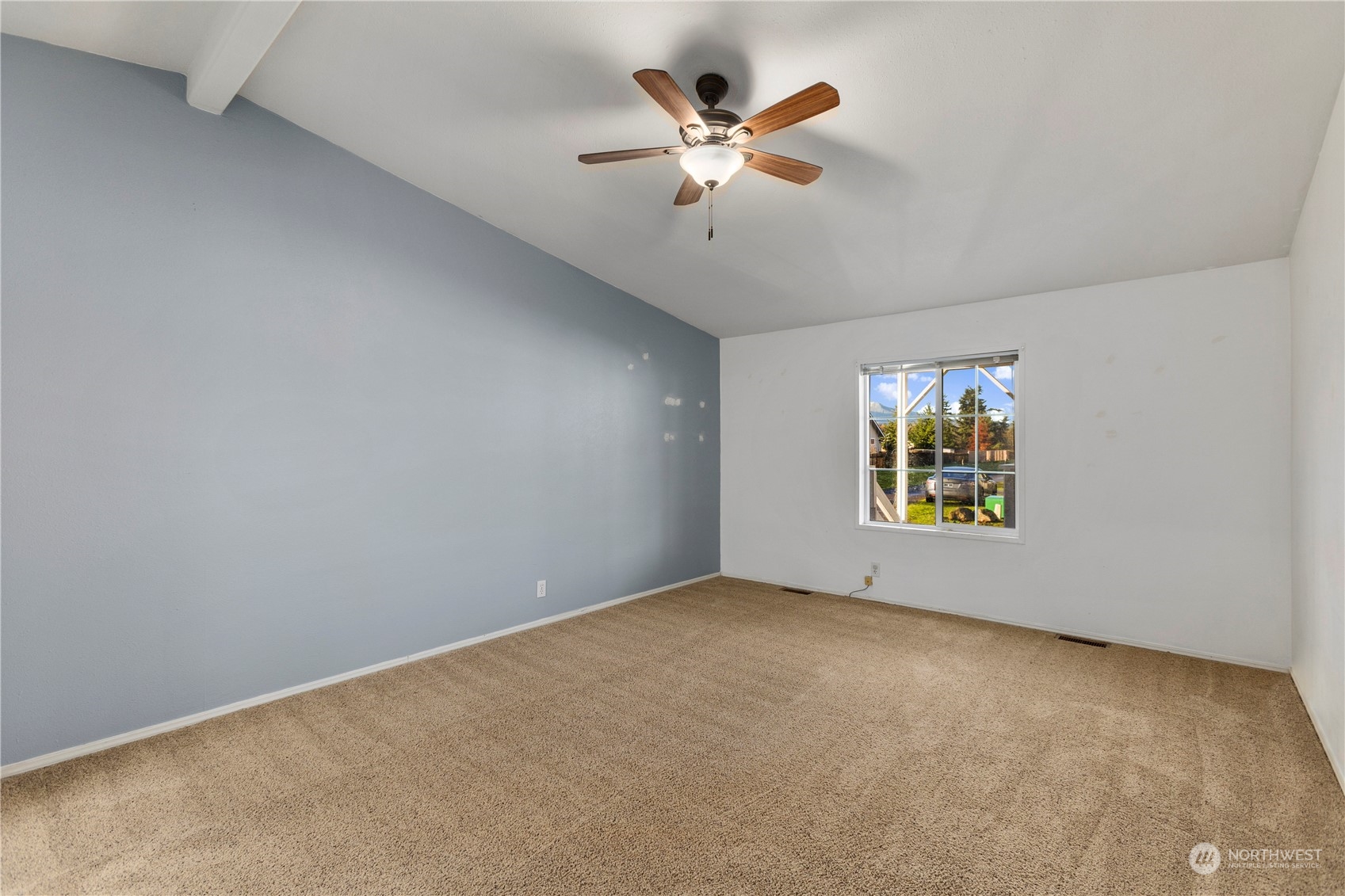208 Carlsborg Road Sequim, WA 98382 - Photo 24 of 40 an empty room with window and ceiling fan