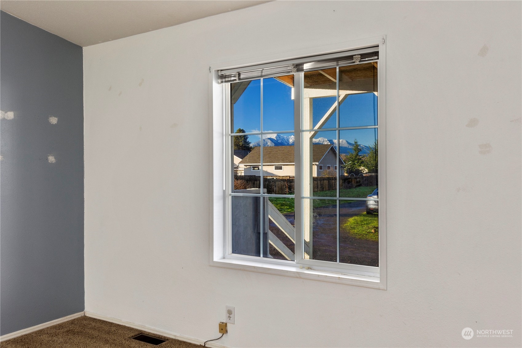 208 Carlsborg Road Sequim, WA 98382 - Photo 25 of 40 a view of staircase with wooden floor and a window