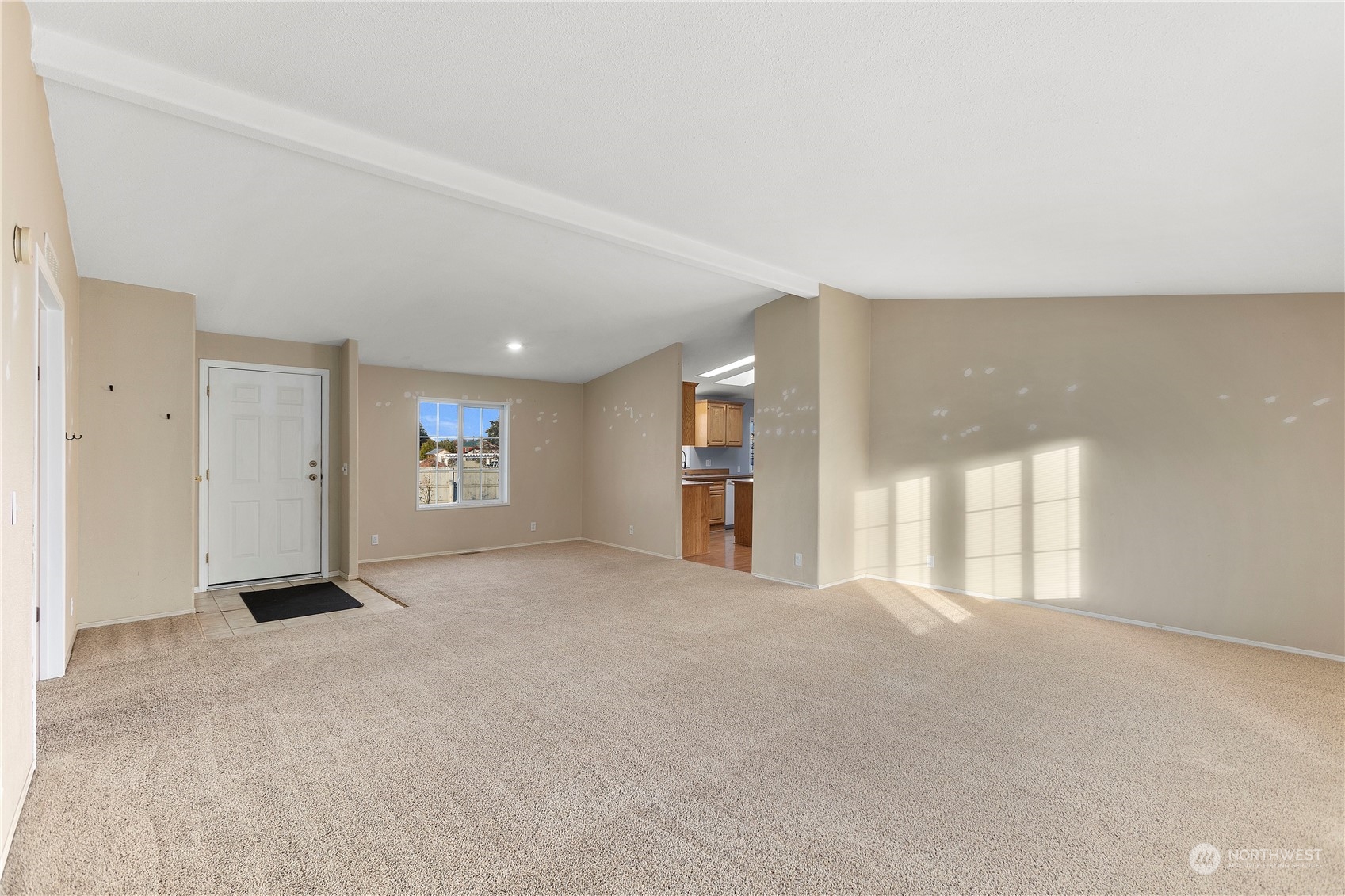 208 Carlsborg Road Sequim, WA 98382 - Photo 9 of 40 a view of an empty room with a window