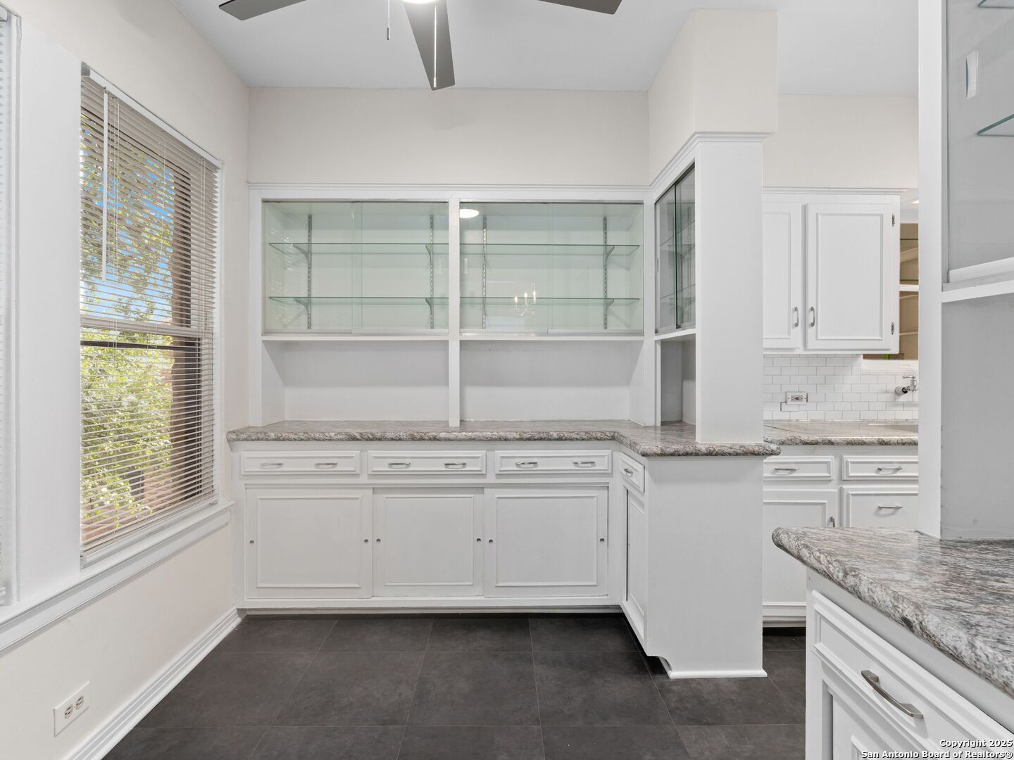 146 Terrell Road Alamo Heights, TX 78209 - Photo 13 of 29 a kitchen with stainless steel appliances granite countertop a stove and a sink