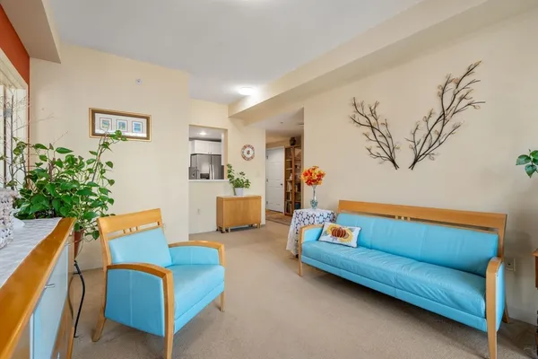 a living room with furniture and a couch