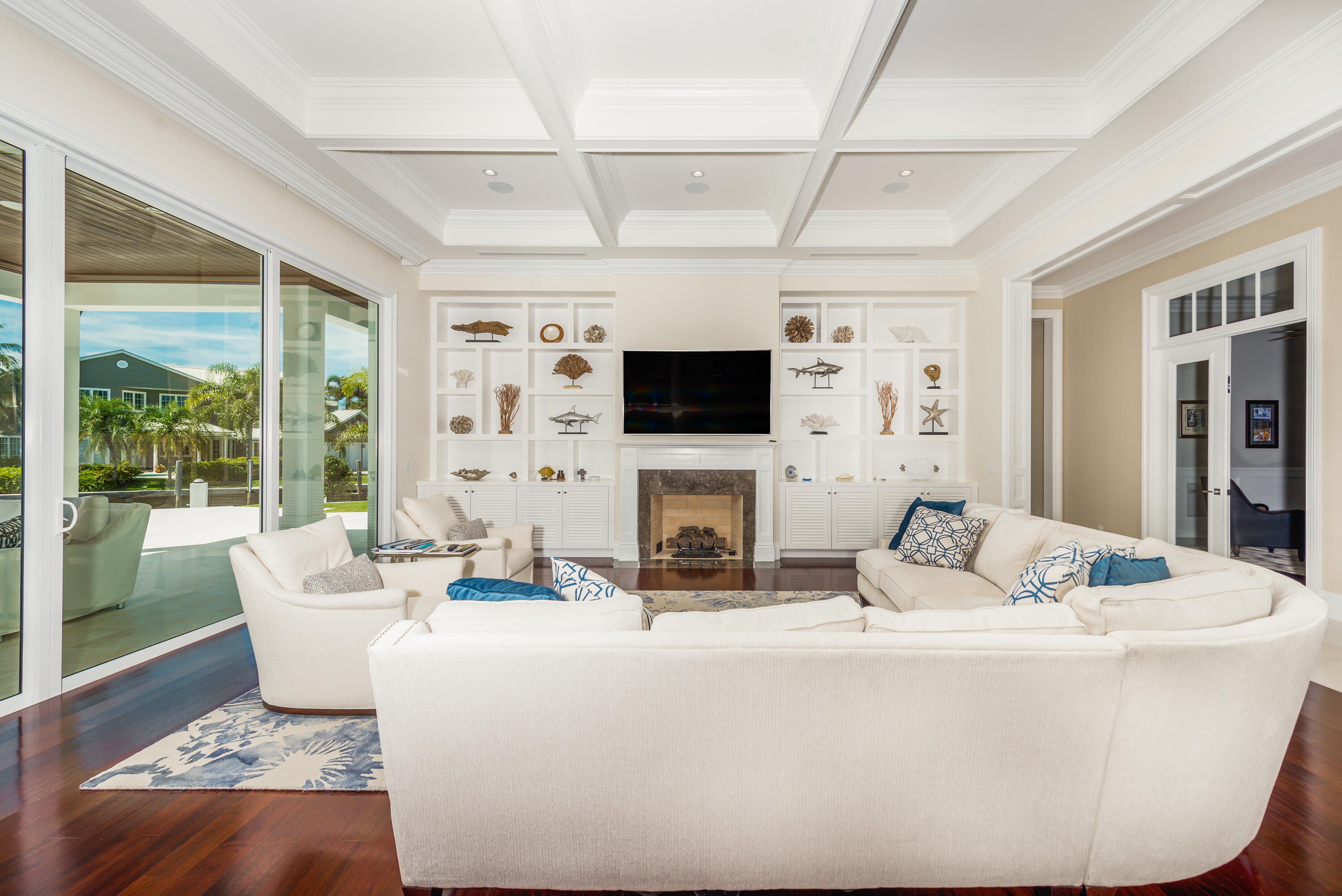 976 Cypress Drive Delray Beach, FL 33483 - Photo 14 of 38 a living room with fireplace furniture and a flat screen tv