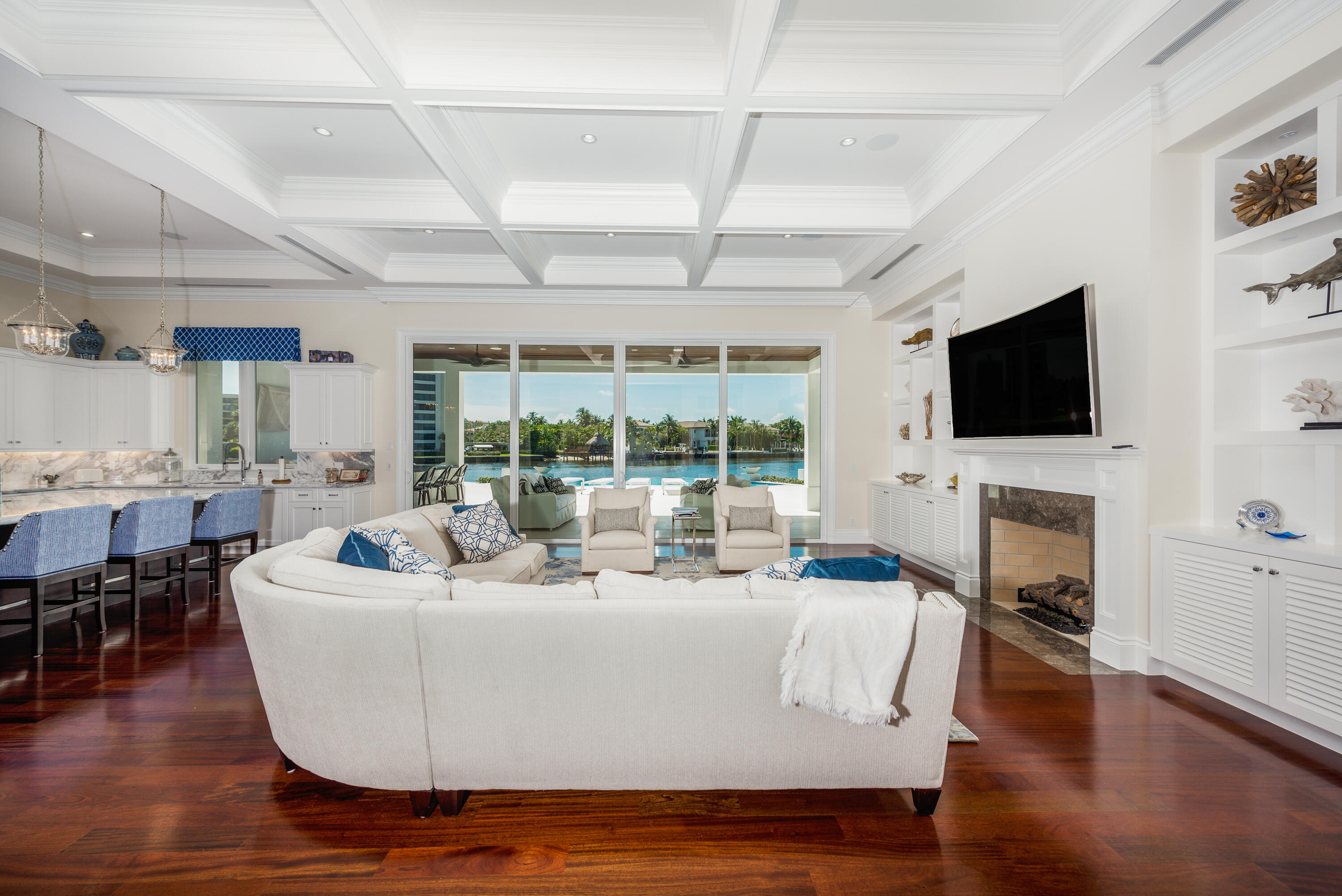 976 Cypress Drive Delray Beach, FL 33483 - Photo 15 of 38 a living room with fireplace furniture and a flat screen tv