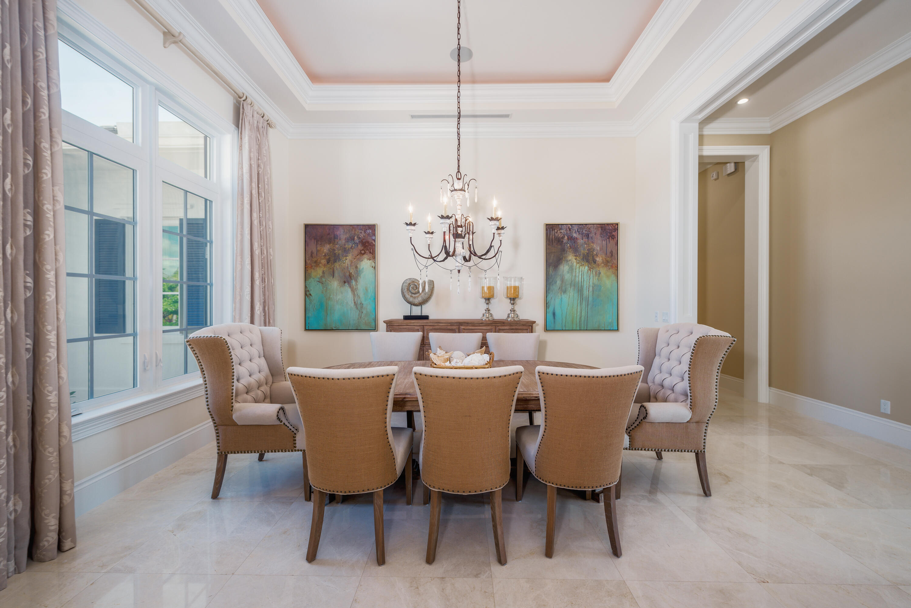 976 Cypress Drive Delray Beach, FL 33483 - Photo 19 of 38 a dining room with furniture a chandelier and window
