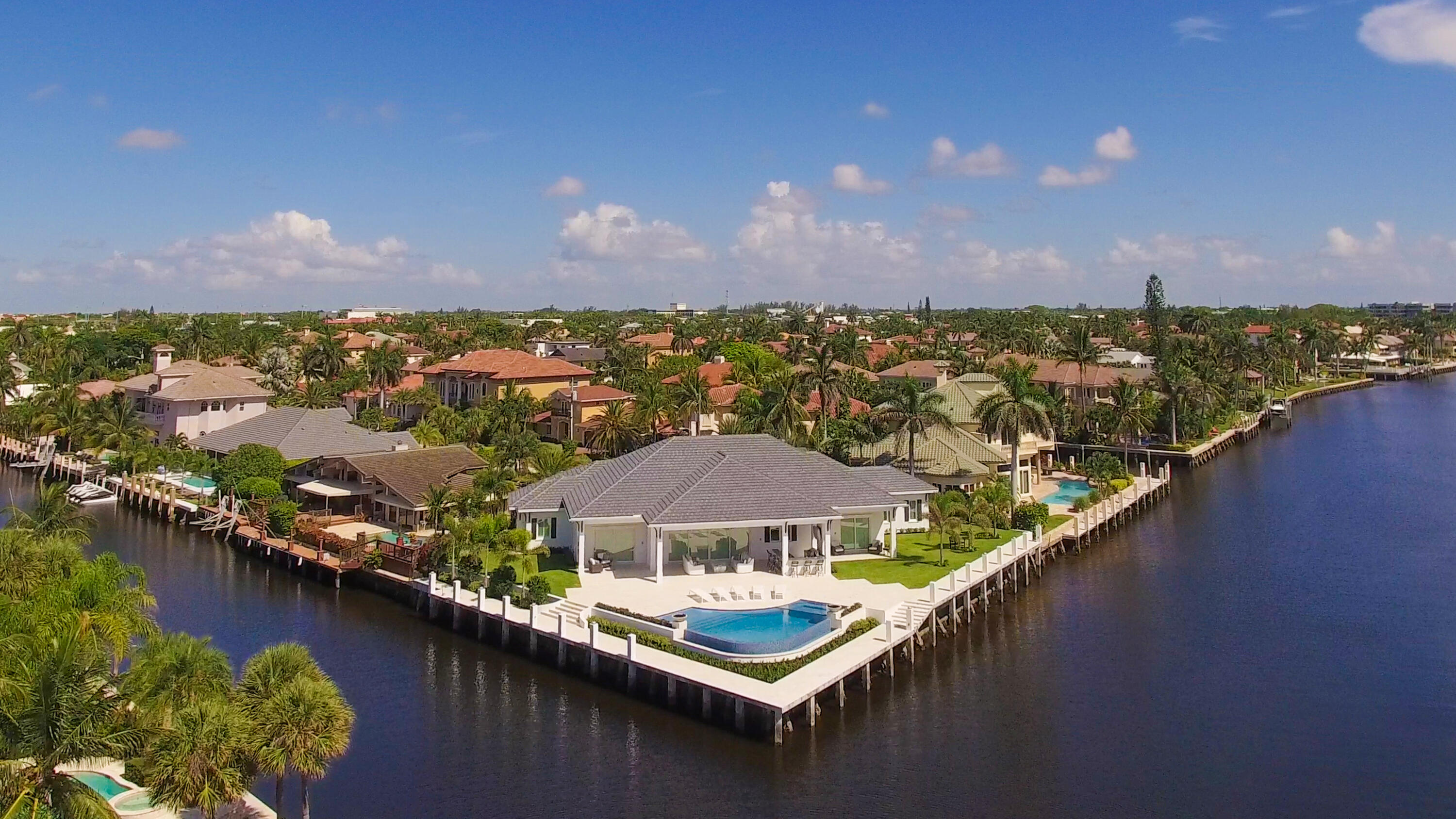 976 Cypress Drive Delray Beach, FL 33483 - Photo 3 of 38 an aerial view of residential houses with outdoor space and lake view