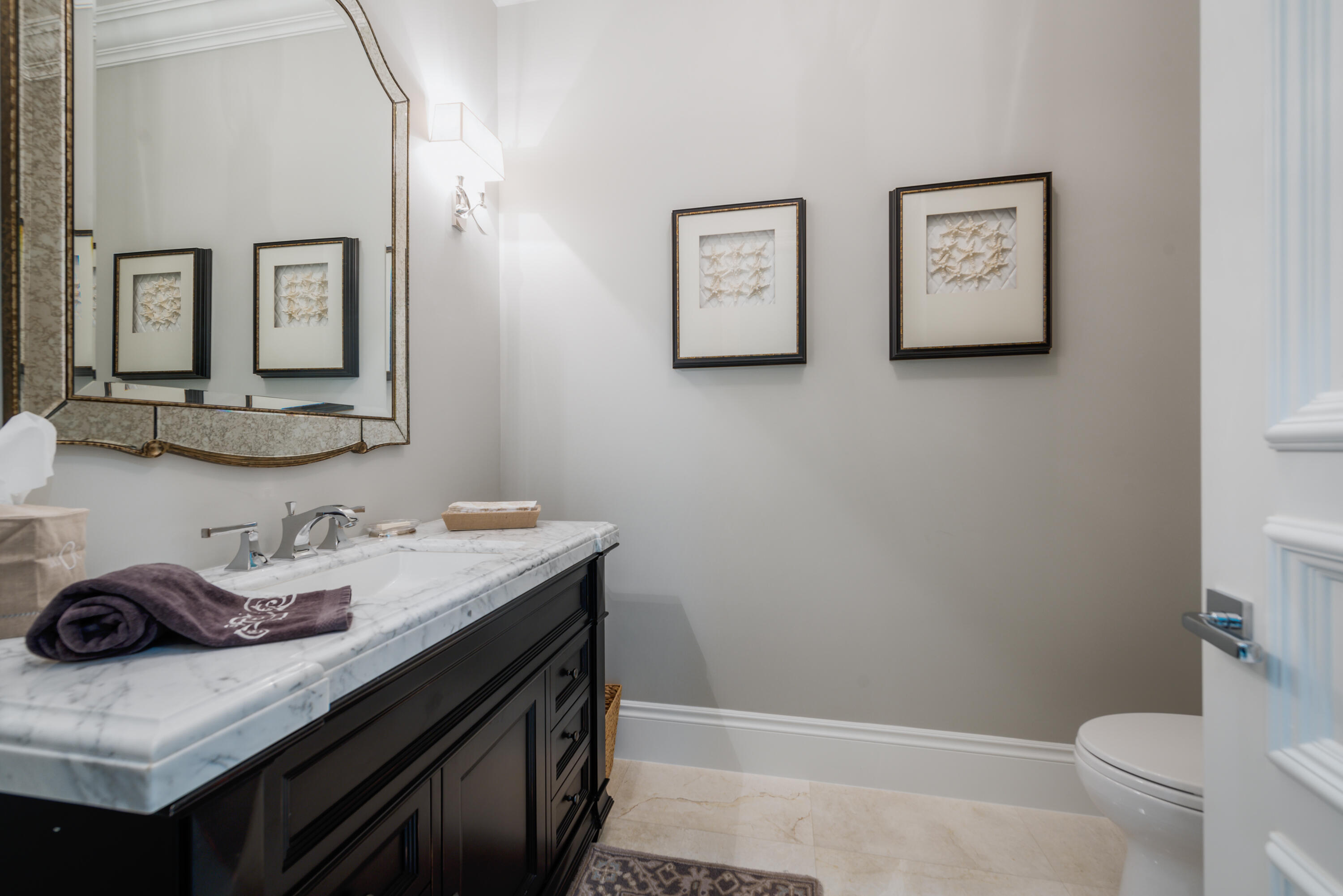 976 Cypress Drive Delray Beach, FL 33483 - Photo 21 of 38 a bathroom with a sink and a toilet