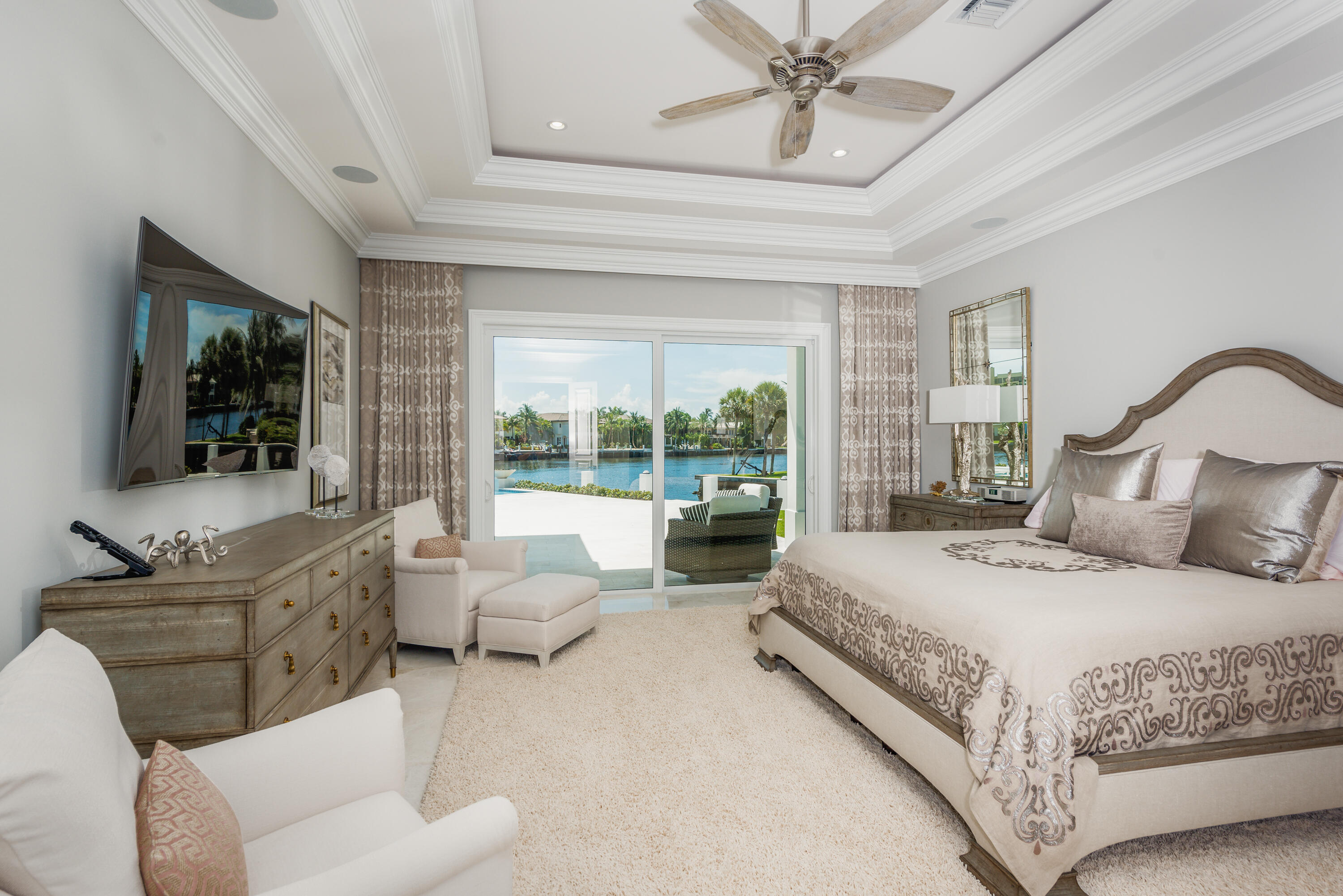 976 Cypress Drive Delray Beach, FL 33483 - Photo 22 of 38 a bedroom with a bed and a couch