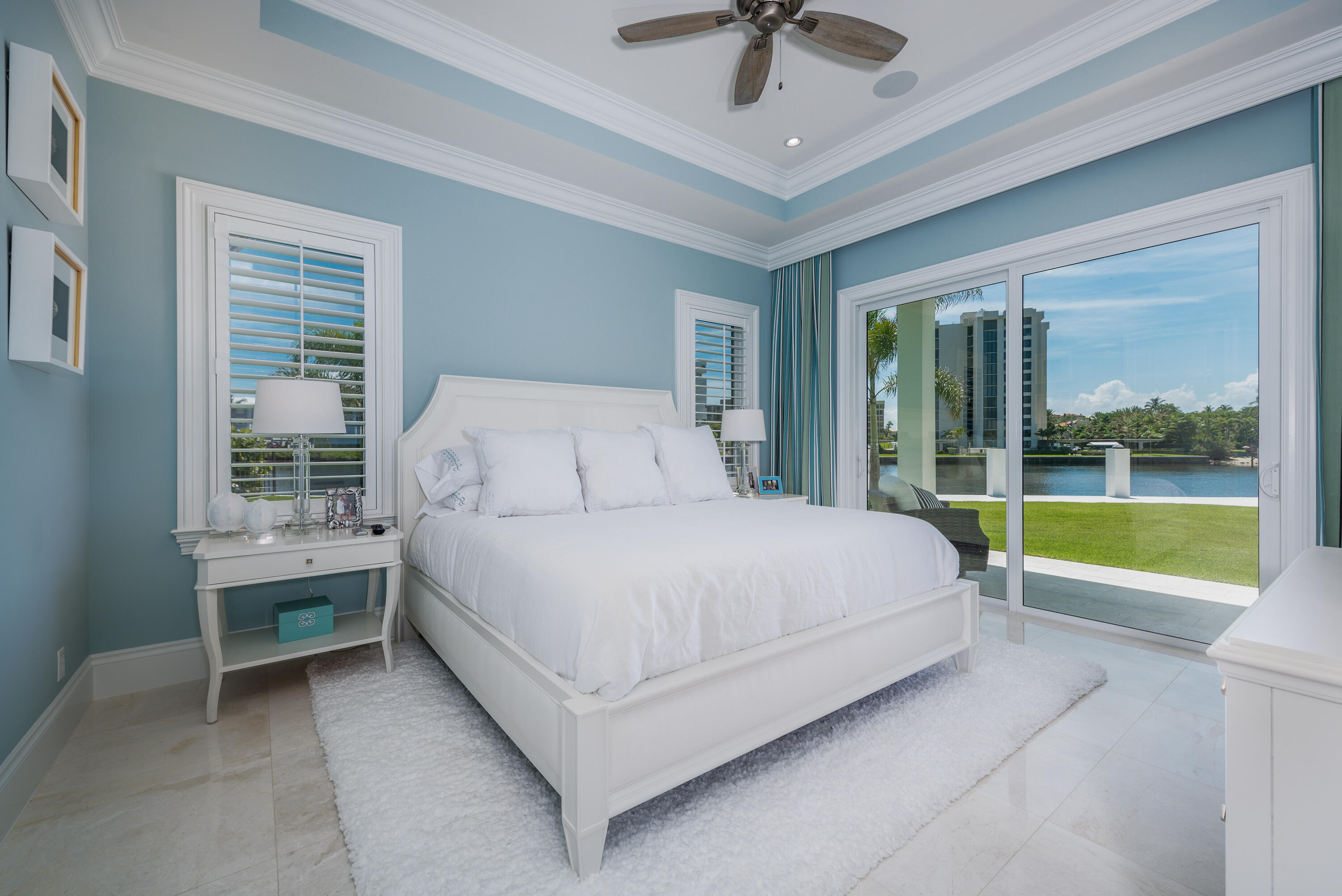976 Cypress Drive Delray Beach, FL 33483 - Photo 25 of 38 a spacious bedroom with a bed and a large window