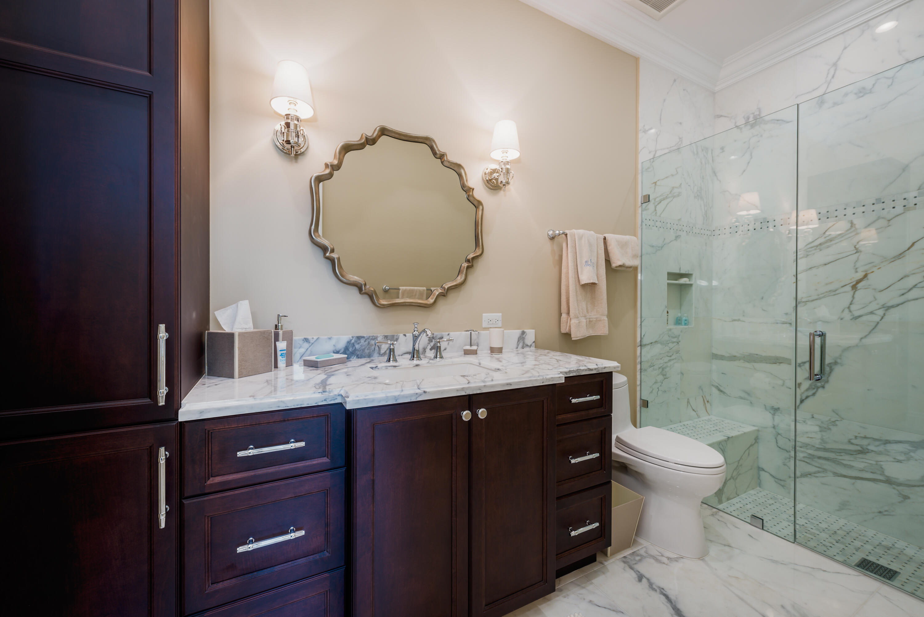 976 Cypress Drive Delray Beach, FL 33483 - Photo 30 of 38 a bathroom with a granite countertop toilet sink and mirror