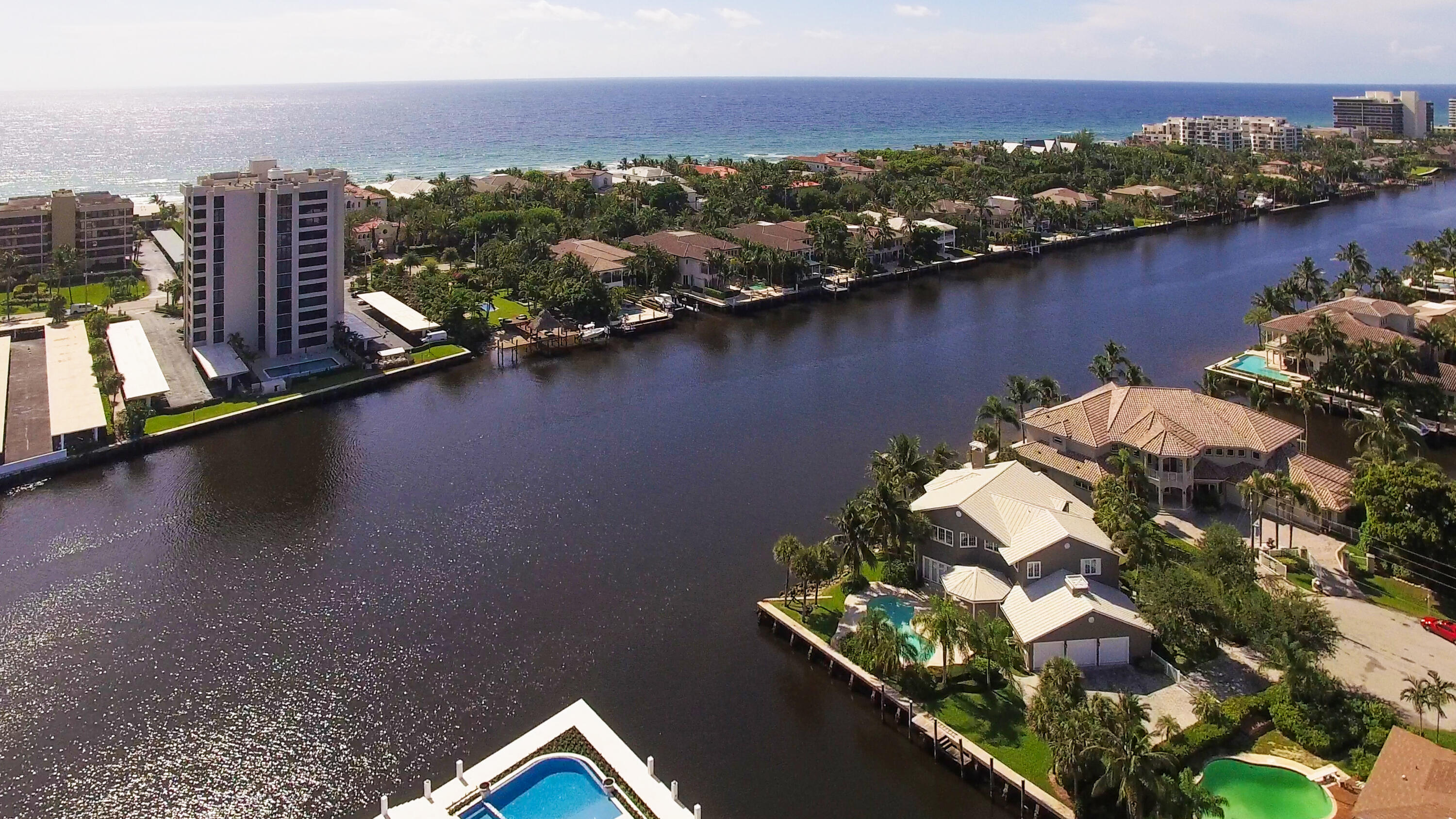 976 Cypress Drive Delray Beach, FL 33483 - Photo 4 of 38 an aerial view of residential houses with outdoor space and lake view