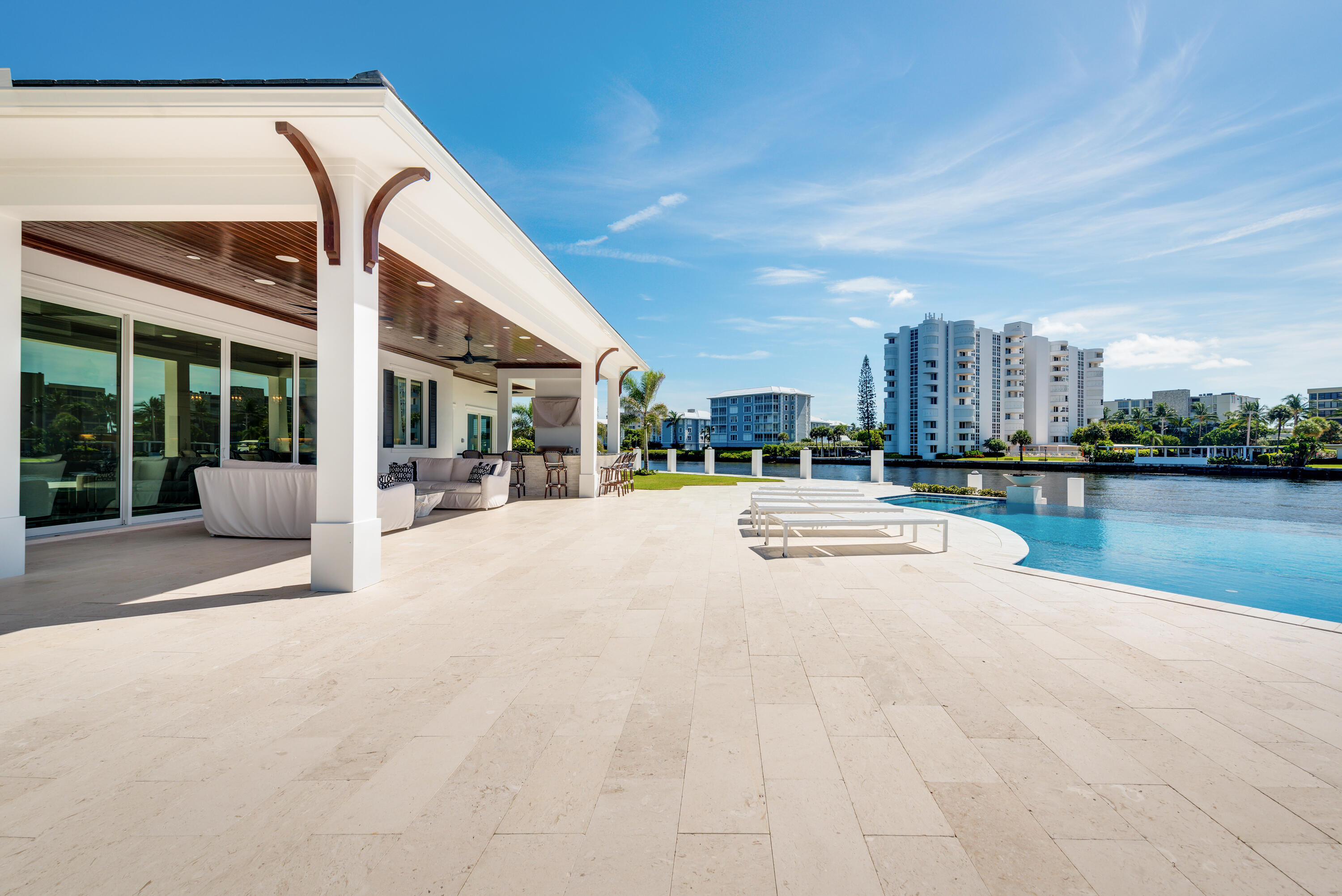 976 Cypress Drive Delray Beach, FL 33483 - Photo 34 of 38 a view of swimming pool with outdoor seating and lake view