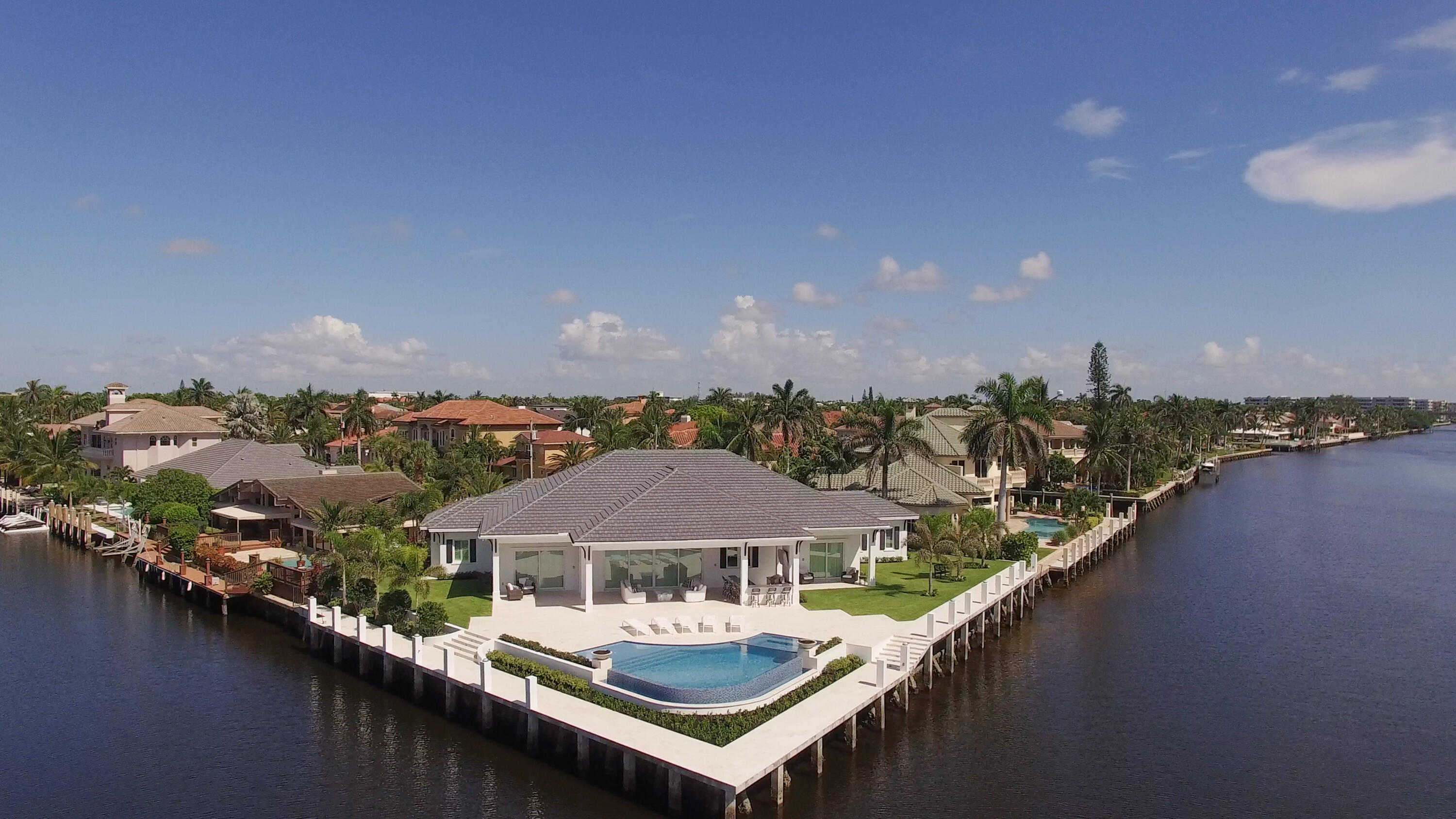 976 Cypress Drive Delray Beach, FL 33483 - Photo 38 of 38 a balcony with a table and chairs