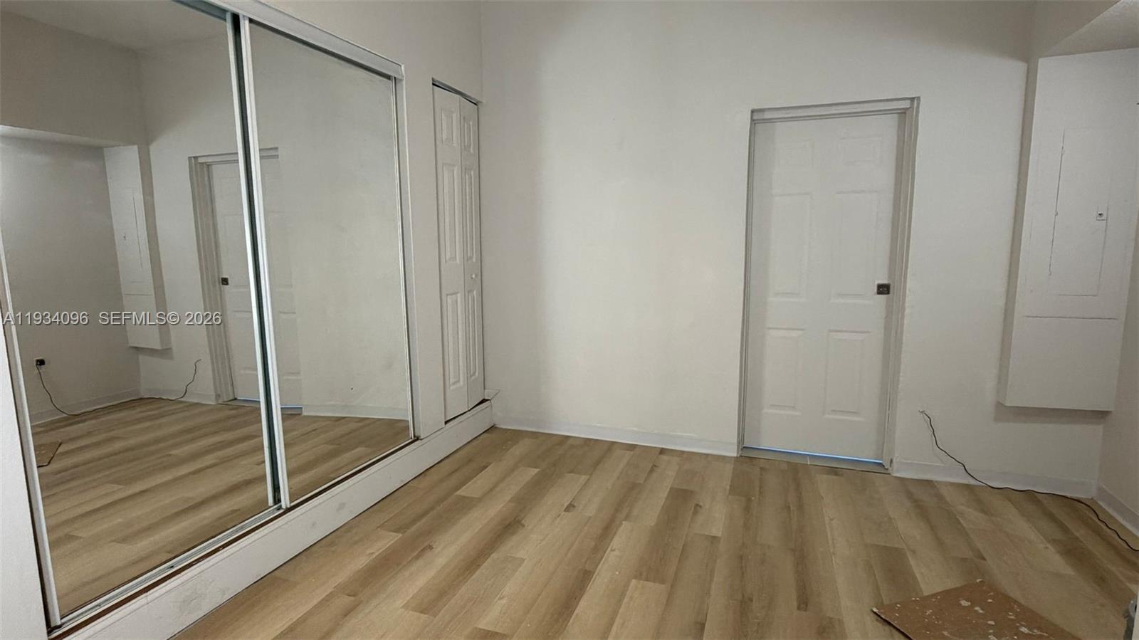 15730 Southwest 140th Street, Unit 15730 Miami, FL 33196 - Photo 2 of 10 a view of wooden floor