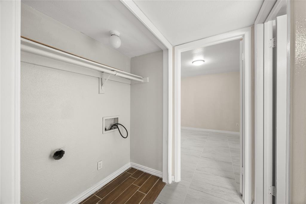 8110 Skillman Street, Unit 2053 Dallas, TX 75231 - Photo 6 of 12 a bathroom with a glass shower door