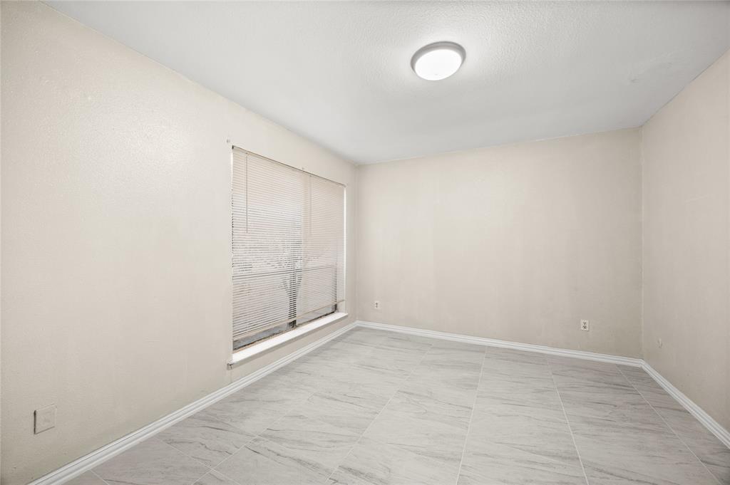 8110 Skillman Street, Unit 2053 Dallas, TX 75231 - Photo 8 of 12 a view of an empty room