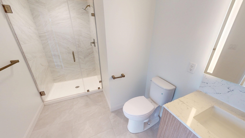 60 Kilmarnock Street, Unit 842 Boston, MA 02215 - Photo 13 of 13 a bathroom with a sink and a toilet