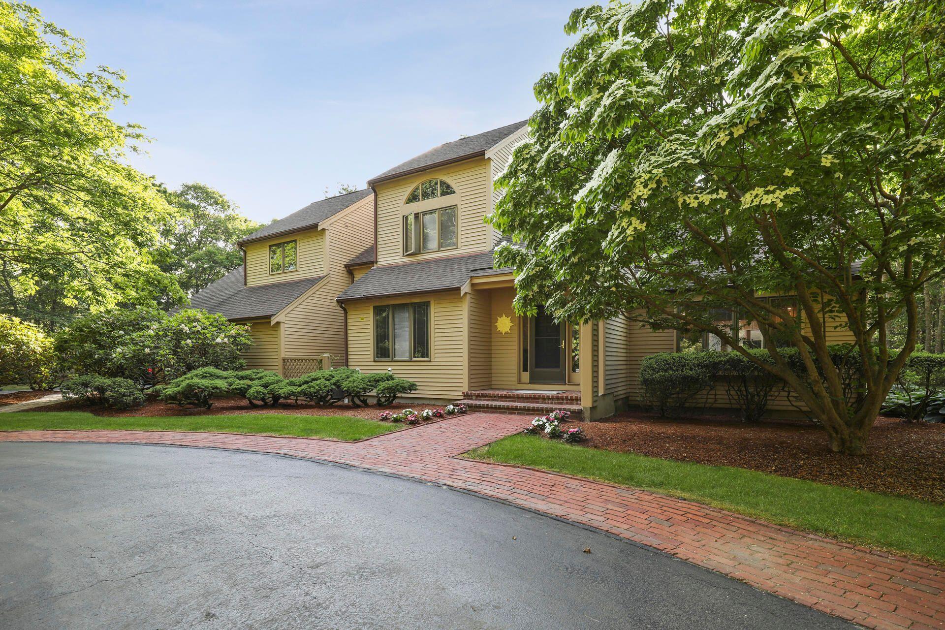 60 Smoke Valley Road Osterville, MA 02655 - Photo 5 of 12 a front view of house with yard and green space
