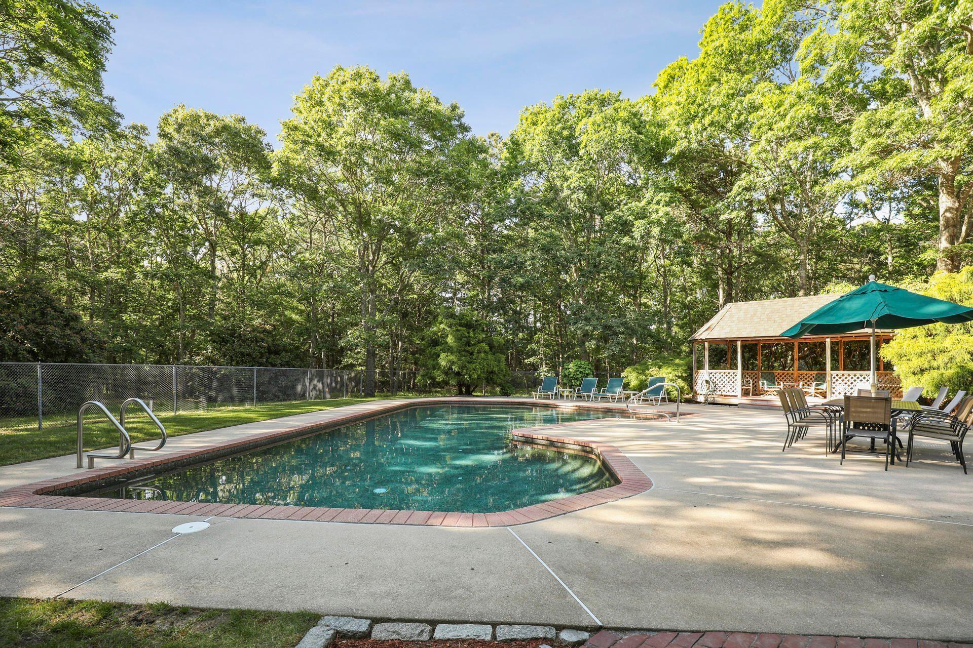 60 Smoke Valley Road Osterville, MA 02655 - Photo 10 of 12 a view of a park with large trees