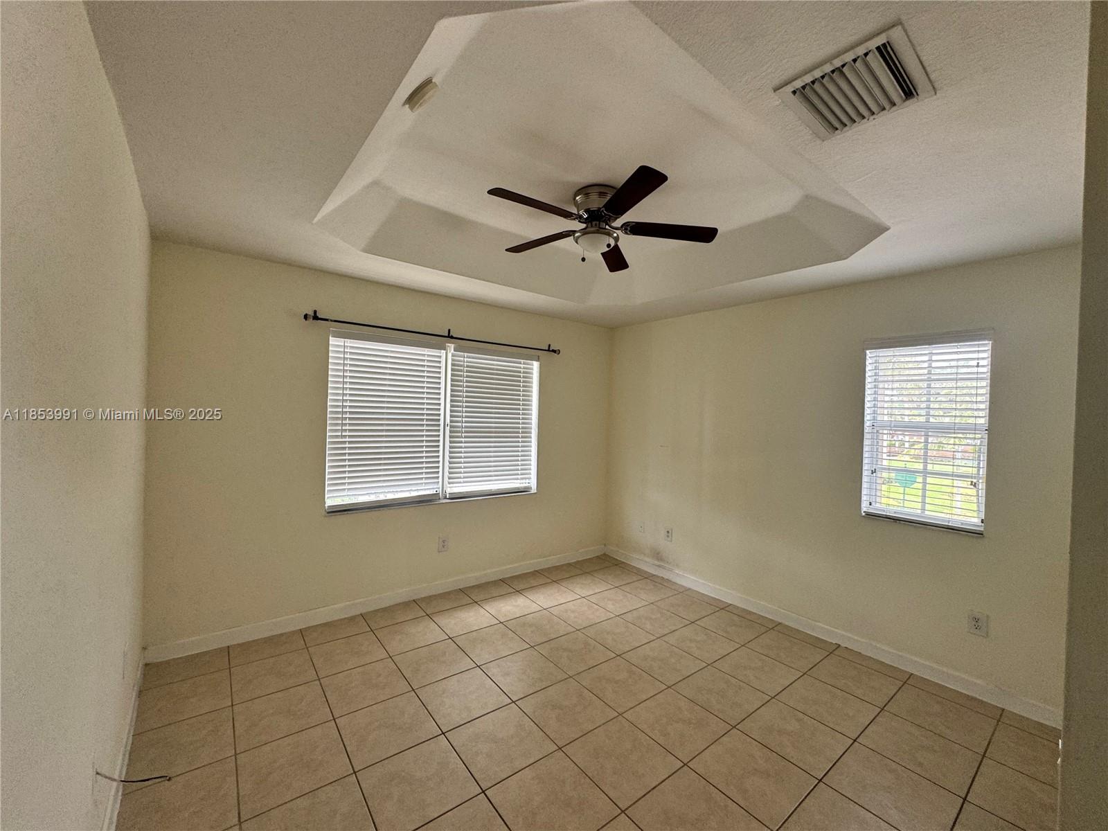 1485 Northeast 33rd Road, Unit 2121 Homestead, FL 33033 - Photo 12 of 19 a view of an empty room with a window