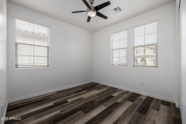 an empty room with windows