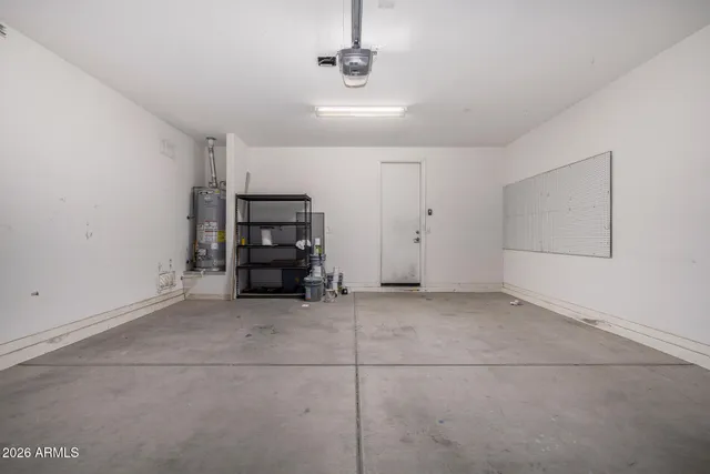 a view of empty room with closet